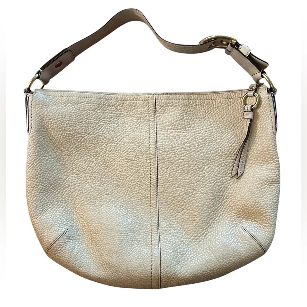 Coach | Women’s cream pebbled leather round bottom over the shoulder purse, OS